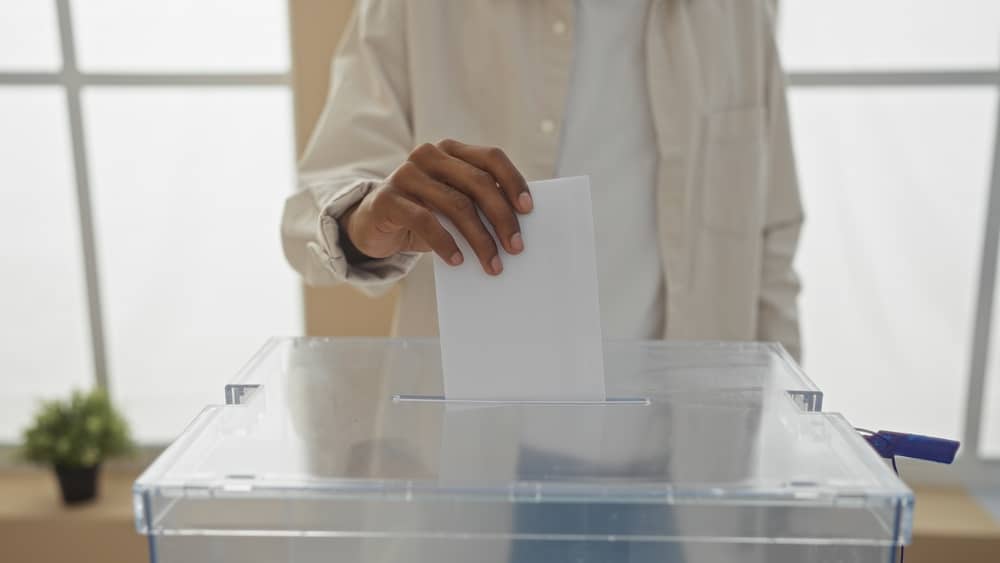 An,African,American,Man,Casting,A,Vote,By,Placing,A orial-election-cse